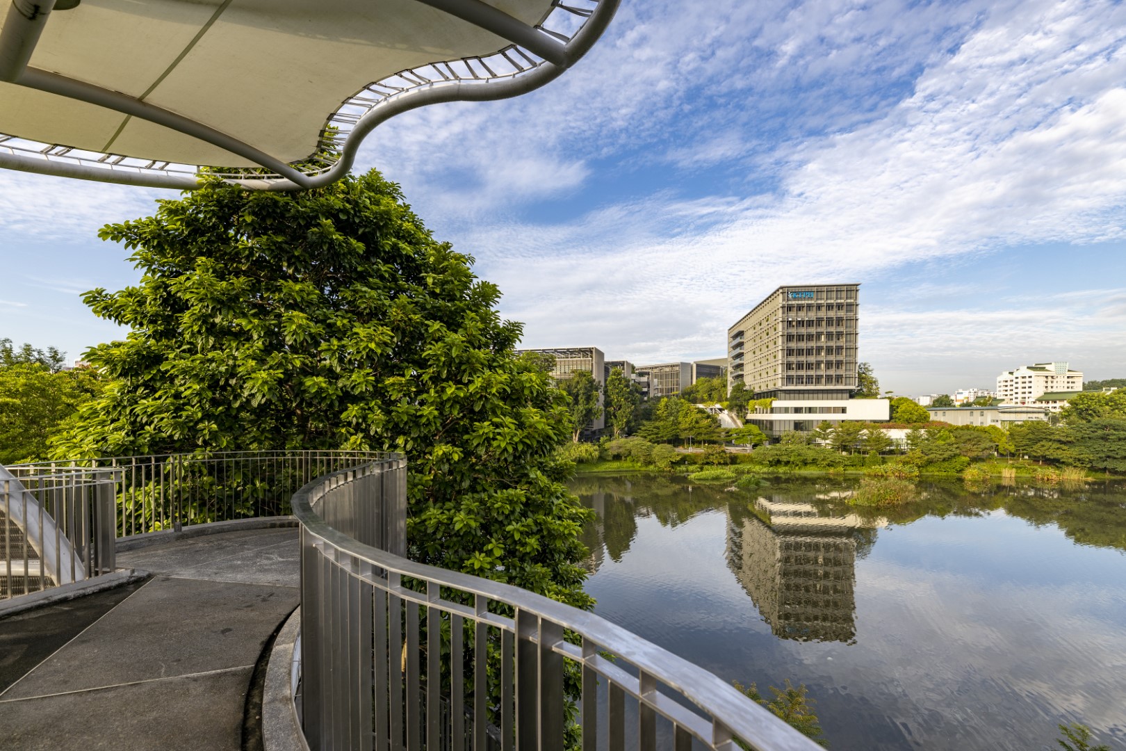 Opening up to the adjacent Yishun Pond, Khoo Teck Puat Hospital was designed to embrace nature and nurture a healing environment