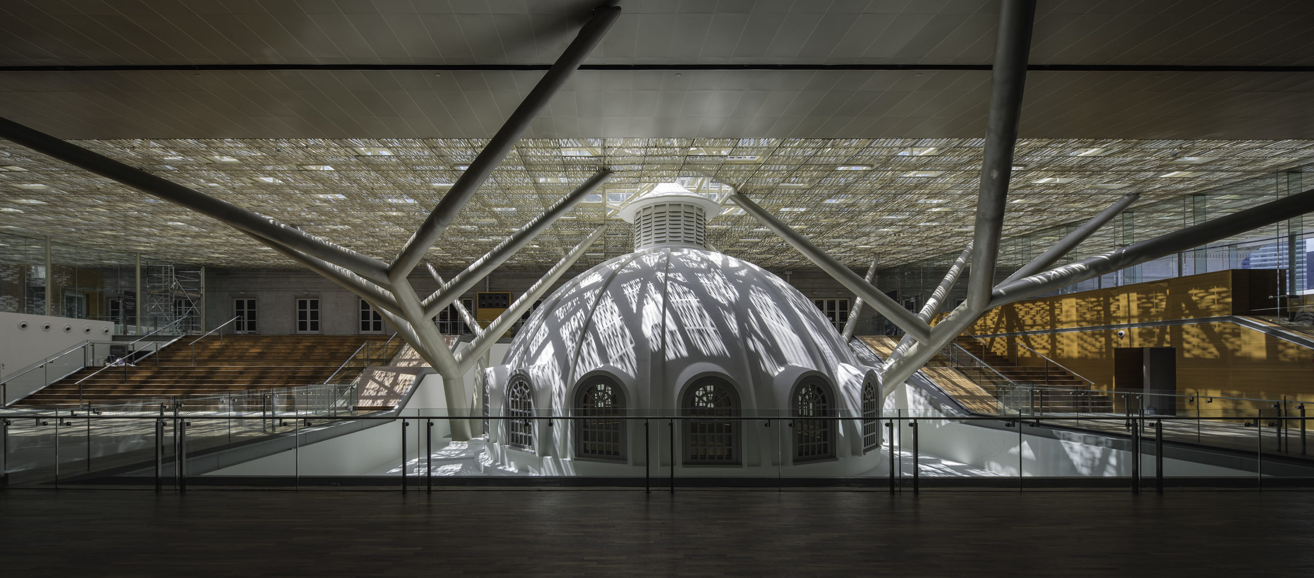 Soft, natural lighting filtered by the roof canopy, National Gallery Singapore